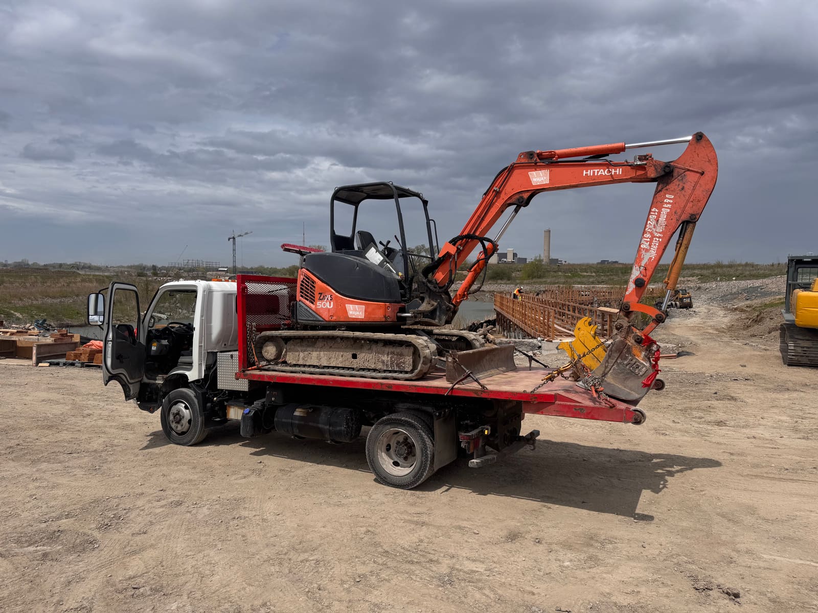 Excavator on the flatbed