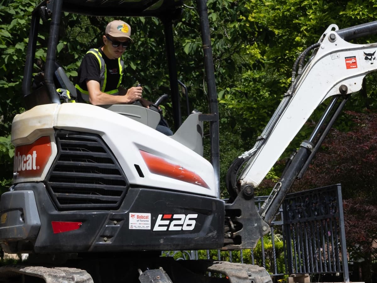 Antoni running the E26 excavator on a job